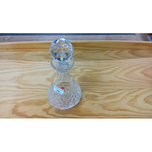 73 - Tyrone crystal decanter with a faceted stopper, featuring an intricate diamond pattern design.