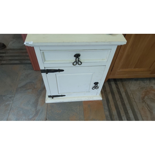 80 - Single white wooden cabinet with black metal hardware, featuring one drawer and one door with tradit... 