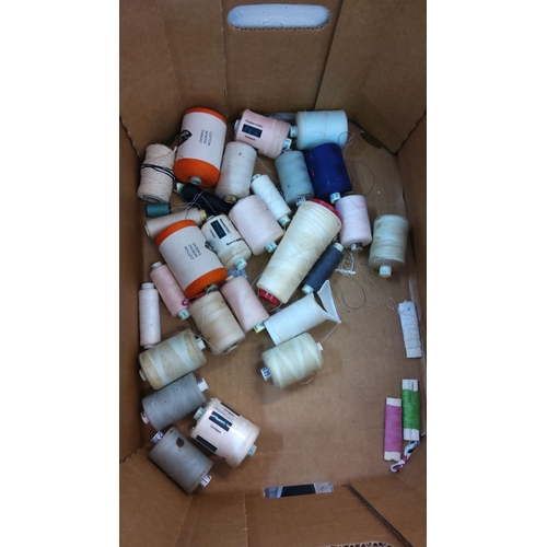 82 - Assorted mixed sewing thread spools. Includes cotton and polyester blends in multiple colors and siz... 