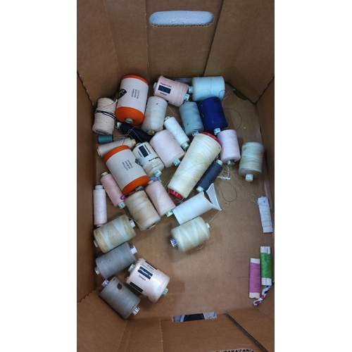 82 - Assorted mixed sewing thread spools. Includes cotton and polyester blends in multiple colors and siz... 