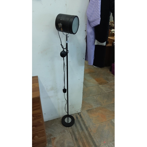 86 - Black mid-century modern floor lamp with industrial-style spotlight head. Height adjustable with an ... 