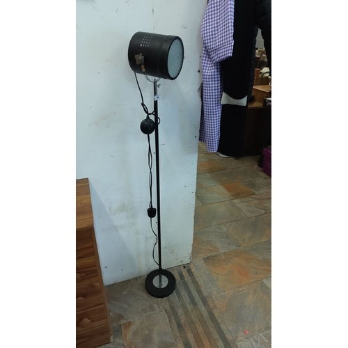 86 - Black mid-century modern floor lamp with industrial-style spotlight head. Height adjustable with an ... 