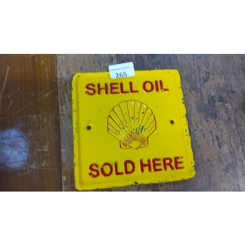 265 - Cast Iron Shell Oil sign in yellow with red lettering and shell motif, marked 