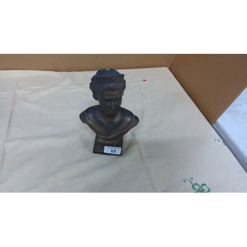 12 - Bronze bust depicting Queen Elizabeth with a decorative collar, mounted on a square base.
