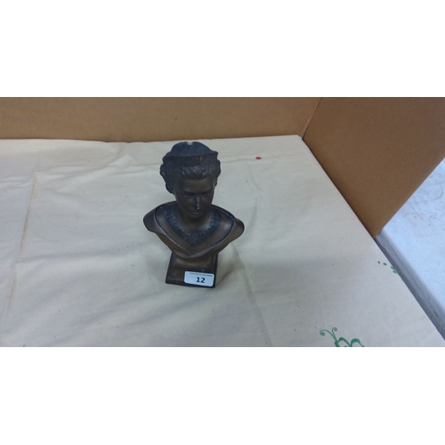 12 - Bronze bust depicting Queen Elizabeth with a decorative collar, mounted on a square base.