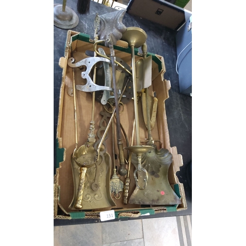 151 - Assorted vintage brass fireplace tools, including shovels, tongs, pokers, stand elements, and other ... 