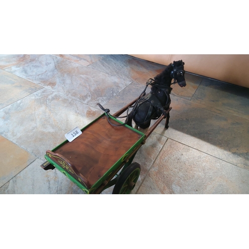 158 - Vintage wooden horse-drawn cart model featuring hand-painted green and brown accents, detailed harne... 