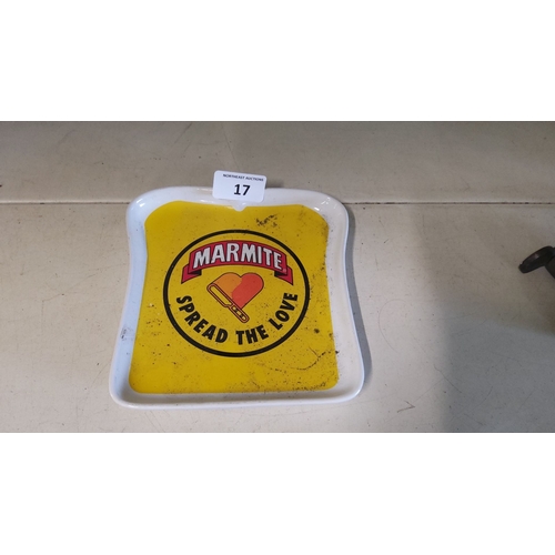 17 - Marmite-themed advertising plate with a molded white frame and bright yellow centerpiece.