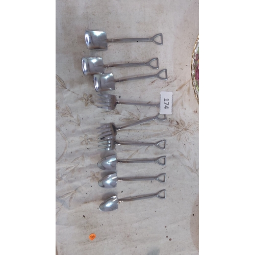 174 - Set of eight miniature shovel and fork-shaped stainless steel spoons. Unique design.