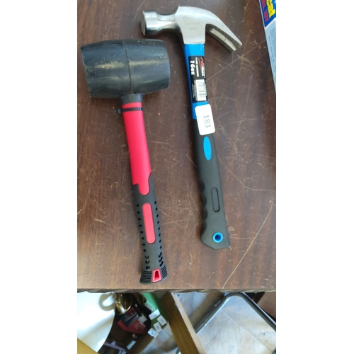 183 - Rubber mallet with red and black handle. 16oz drop-forged claw hammer with blue and black handle.