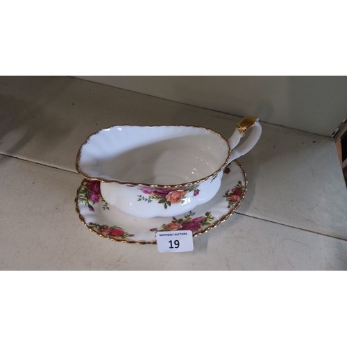 19 - Royal Albert bone china gravy boat and attached plate in the 