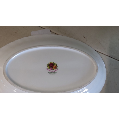 19 - Royal Albert bone china gravy boat and attached plate in the 