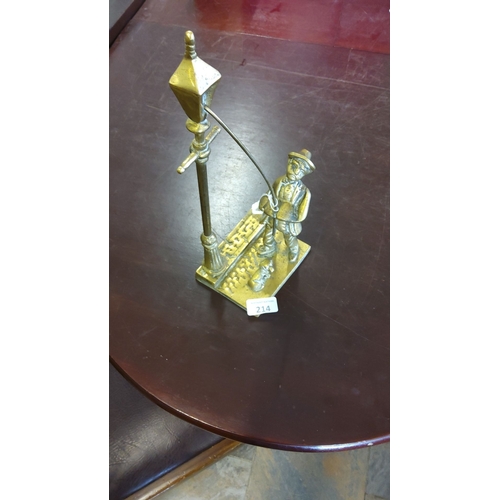 214 - Solid Brass figural Victorian lamplighter next to a street lantern. Detailed casting detailing on th... 