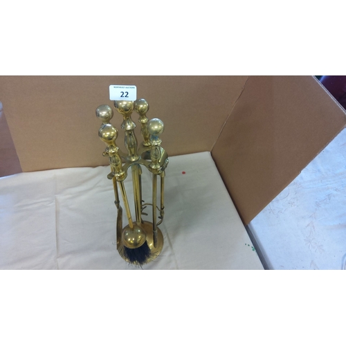 22 - Brass fireplace companion set consisting of a shovel, brush, tongs, poker, and stand. Decorative glo... 