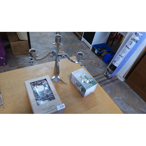 236 - Decorative candle holders, a modern, polished metal candelabrum and boxed set of 2 pieces. Includes ... 