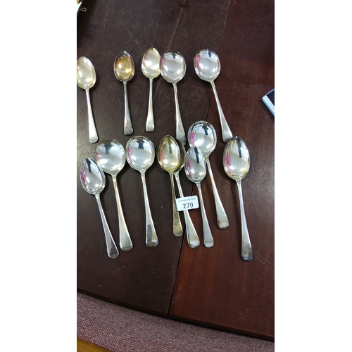 279 - Set of 12 silver plated spoons with classic rounded bowls and elegant handles.