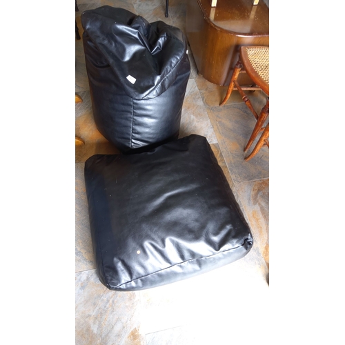 286 - Pair of black faux leather bean bag chairs, contemporary design.