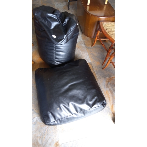 286 - Pair of black faux leather bean bag chairs, contemporary design.