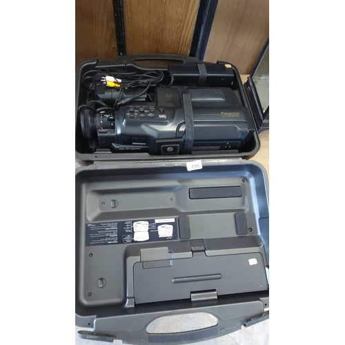 298 - Panasonic M10 VHS Camcorder with case. Features Hi-Fi stereo recording capabilities. Includes contro... 