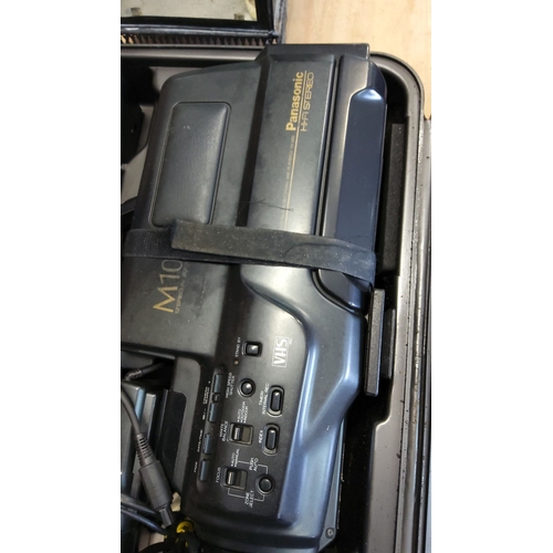 298 - Panasonic M10 VHS Camcorder with case. Features Hi-Fi stereo recording capabilities. Includes contro... 