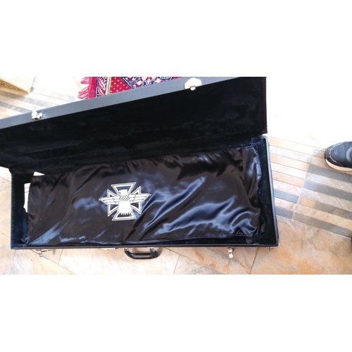 303 - Gibson Blackbird guitar case with custom interior lining, emblazoned with emblem detail.