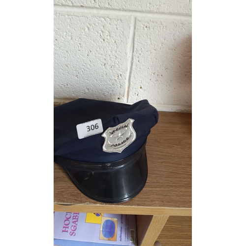 306 - Police cap featuring a 