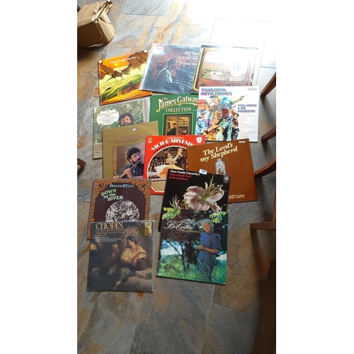 309 - Mixed lot of 13 vinyl records. Includes classical, religious, family favorites, and movie themes. Ar... 