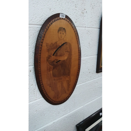 359 - Oval wooden plaque with etched art depicting a figure holding a lyre, adorned with geometric border ... 