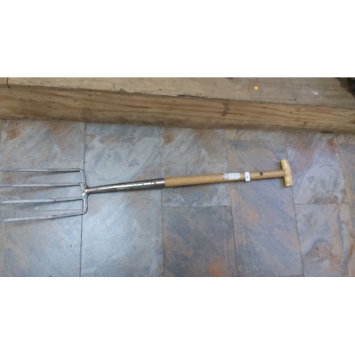 362 - Digging Fork with T-handle and wooden shaft, featuring a stainless steel, four-tine fork.