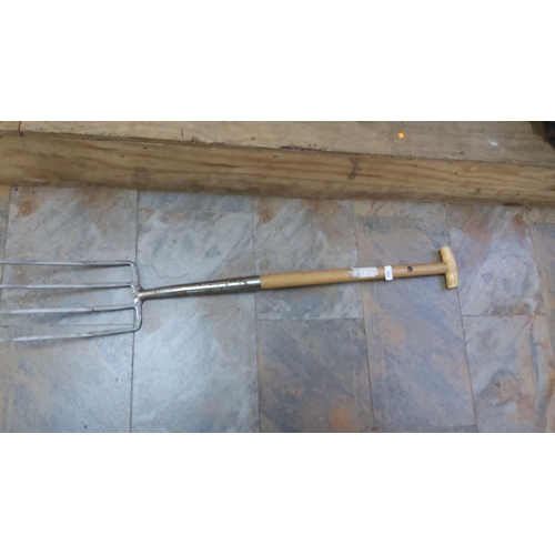 362 - Digging Fork with T-handle and wooden shaft, featuring a stainless steel, four-tine fork.