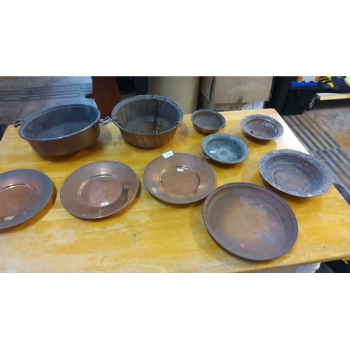 373 - Assorted Vintage Copper and Metal Kitchenware Collection, consisting of 7 plates, 2 pots, and 1 bowl... 