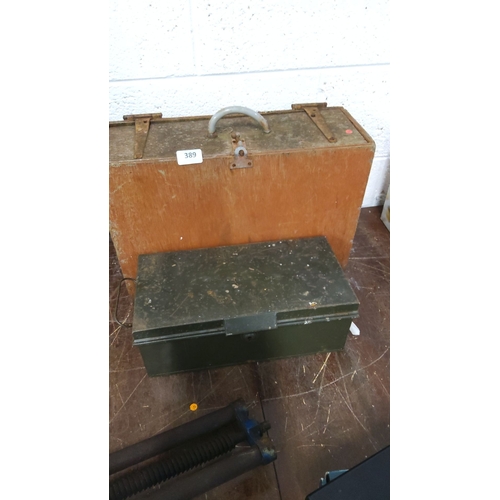 389 - Two vintage toolboxes: one made of wood featuring a metal handle and latch, and a second one made en... 