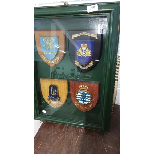 390 - Framed set of four military plaques. Includes Royal Navy, 291 Fd. Bty. RA, Hondeghem, and HMS Wasper... 