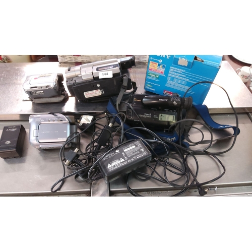 444 - Vintage Sony Handycam camcorder and accessories, including chargers, cables, and an original box. Va... 