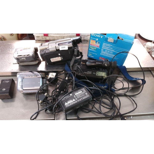 444 - Vintage Sony Handycam camcorder and accessories, including chargers, cables, and an original box. Va... 