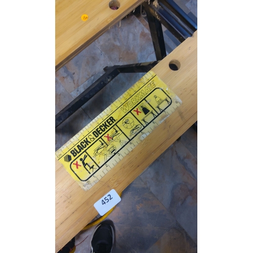 452 - Black & Decker Workmate 331. It is a portable workbench that has a sturdy steel frame and a wooden w... 