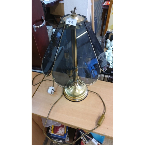 480 - Vintage lamp with a brass base and tinted glass shade featuring petal-like panels. Equipped with a U... 