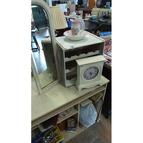 486 - Vintage mixed lot featuring,wooden wine rack, a white wooden clock, a matching mirrr, and a floral w... 