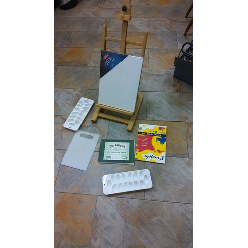 496 - Mixed art supplies including an easel, Winsor & Newton artist canvas, two paint palettes, Daler-Rown... 