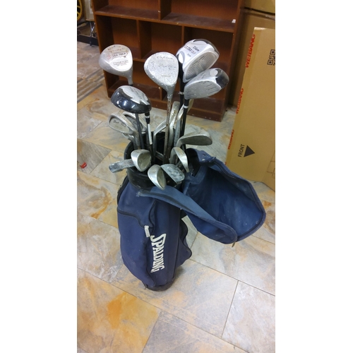 497 - Set of assorted golf clubs including brands such as Spalding and Wilson Ultra. Includes a blue Spald... 