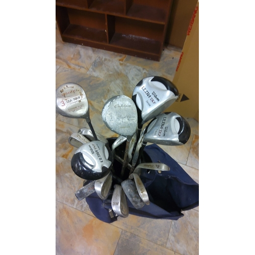 497 - Set of assorted golf clubs including brands such as Spalding and Wilson Ultra. Includes a blue Spald... 