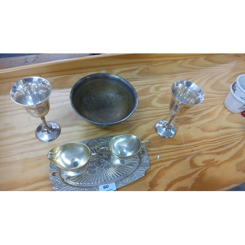 60 - Comprising two sterling silver goblets, a pewter bowl, and a vintage silverplate cream and sugar set... 