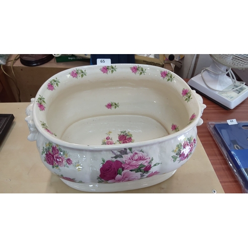 65 - Ironstone ceramic footbath with floral rose motif, marked with 