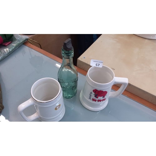 67 - Two ceramic steins and one vintage glass bottle with stopper from Waters & Robson.