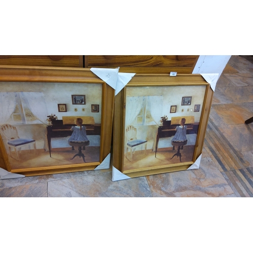 83 - Pair of framed paintings depicting a girl playing the piano in an interior setting. Each painting fe... 