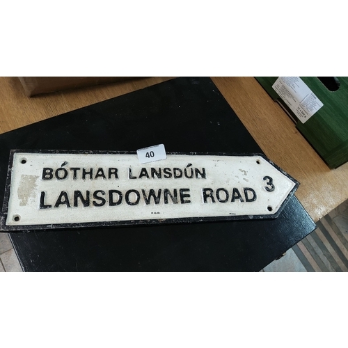 40 - Vintage Lansdowne Road street sign, featuring bilingual English and Irish text with raised black let... 