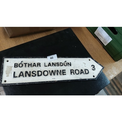 40 - Vintage Lansdowne Road street sign, featuring bilingual English and Irish text with raised black let... 