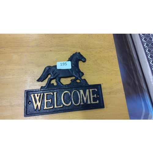 195 - Cast iron sign with gold lettering and horse figure detail. Classic, durable, and elegant decor item... 