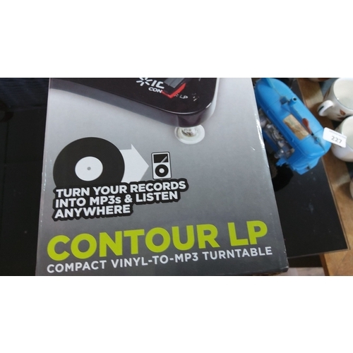 228 - Ion Contour LP turntable, compact vinyl-to-MP3 converter. Includes turntable, USB cable, software CD... 