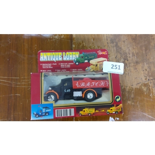 251 - Antique Lorry - Die-cast metal and plastic model featuring a classic truck design in original packag... 